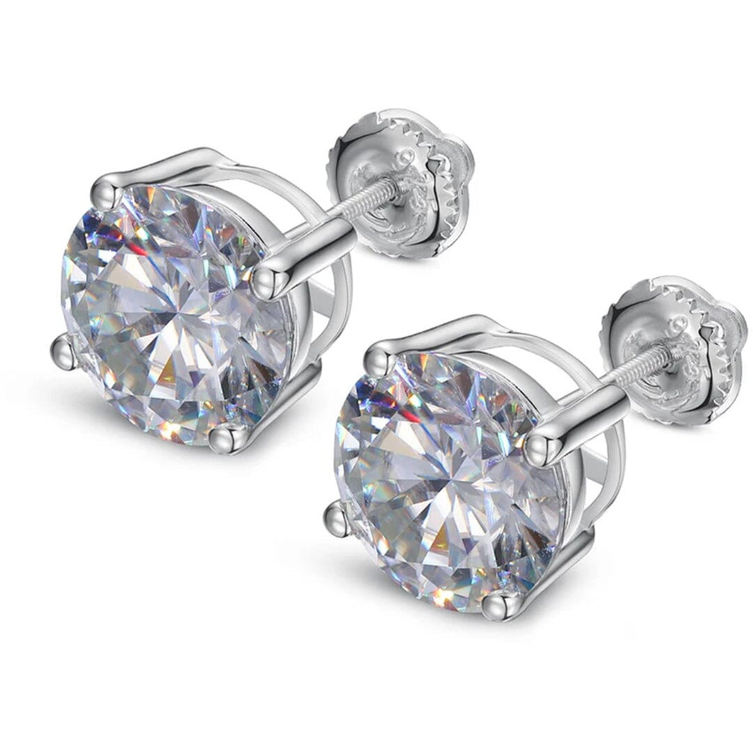 Elegant sterling silver stud earrings with brilliant-cut simulated diamonds, perfect for adding a touch of timeless sparkle to any outfit. Ideal for trending fashion accessories and gift-giving occasions. #StylishElegance #JewelryEssentials #SparklingStuds #FashionTrends