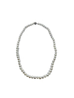 Elevate your style with this timeless pearl necklace, featuring a single black accent pearl for a modern twist on a classic piece. A trending must-have accessory. 