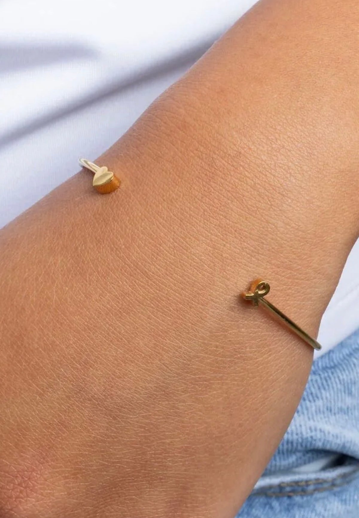 Hope bangle gift set in 18K gold with breast cancer awareness ribbon and heart charms