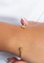 Gold Hope bangle with awareness ribbon charm and heart charm