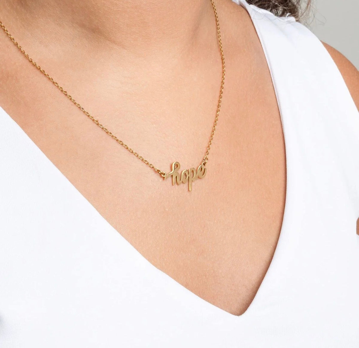 Gold Hope pendant necklace on stainless steel chain