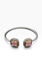 Alice stainless steel bangle with gold-tone accents and pink cubic zirconia cluster ends