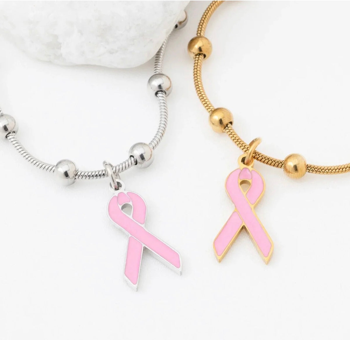 Pink ribbon breast cancer awareness bracelets in gold and silver