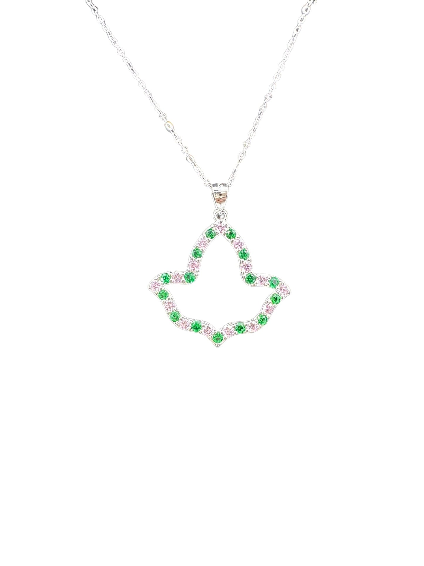 AKA Open Ivy Leaf Necklace in .925 sterling silver with rhodium plating, featuring pink and green cubic zirconia on the edge, hanging from an 18-inch chain with a 2-inch extension.