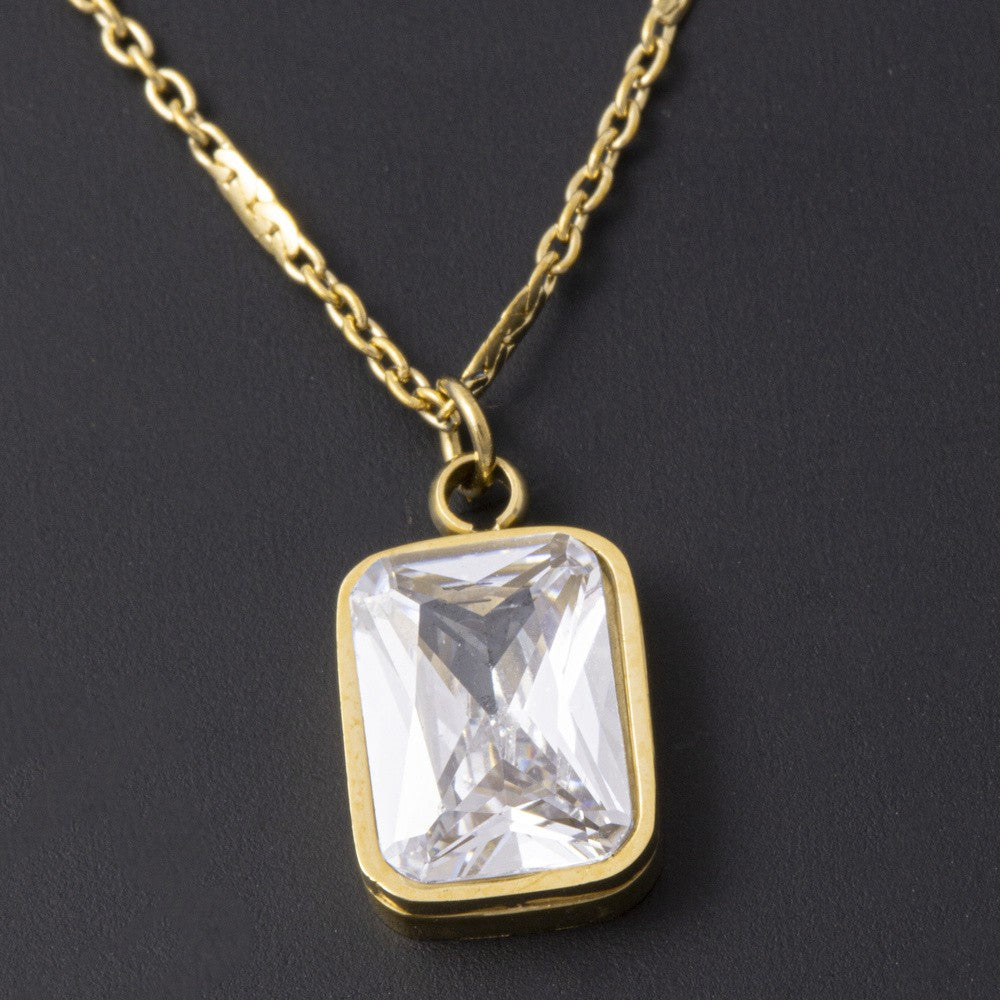 Close-up of 18K gold plated rectangle CZ bezel pendant on a fine chain