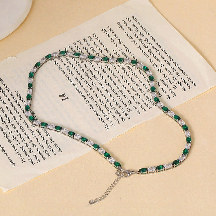 Green and white cubic zirconia tennis necklace in rhodium-plated stainless steel by Trendzio Jewelry