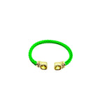 Harriet Braided Cable Large CZ Bracelet in green enamel with a large green CZ stone, brass bangle measures 6.5 inches, 5mm width, elegant and stackable design.