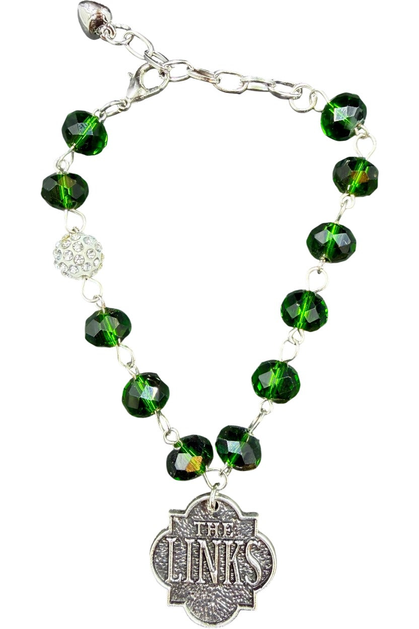The Links, Incorporated green crystal bead bracelet in silver with THE LINKS charm, lobster clasp and extension chain