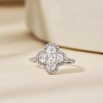 Trendzio Jewelry sterling silver clover ring featuring sparkling CZ diamonds in a halo setting on a neutral background