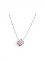Trendzio Jewelry sterling silver clover necklace with pink and green CZ stones on a delicate chain.