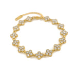 Trendzio Jewelry gold-plated stainless steel clover bracelet featuring sparkling CZ stones, waterproof and tarnish-free.