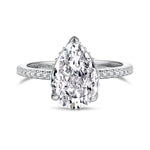Trendzio Jewelry Lolo sterling silver ring featuring a large pear-cut CZ diamond and pavé band.