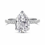 Trendzio Jewelry Lolo sterling silver ring with a pear-cut CZ diamond and pavé band on a white background.