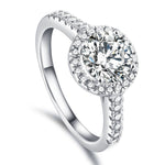 Trendzio Jewelry Lyra sterling silver ring with a round halo CZ diamond and pavé band for a sparkling statement look.