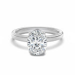 Trendzio Jewelry Sloane oval-cut moissanite engagement ring with a polished silver-tone band and four-prong setting.