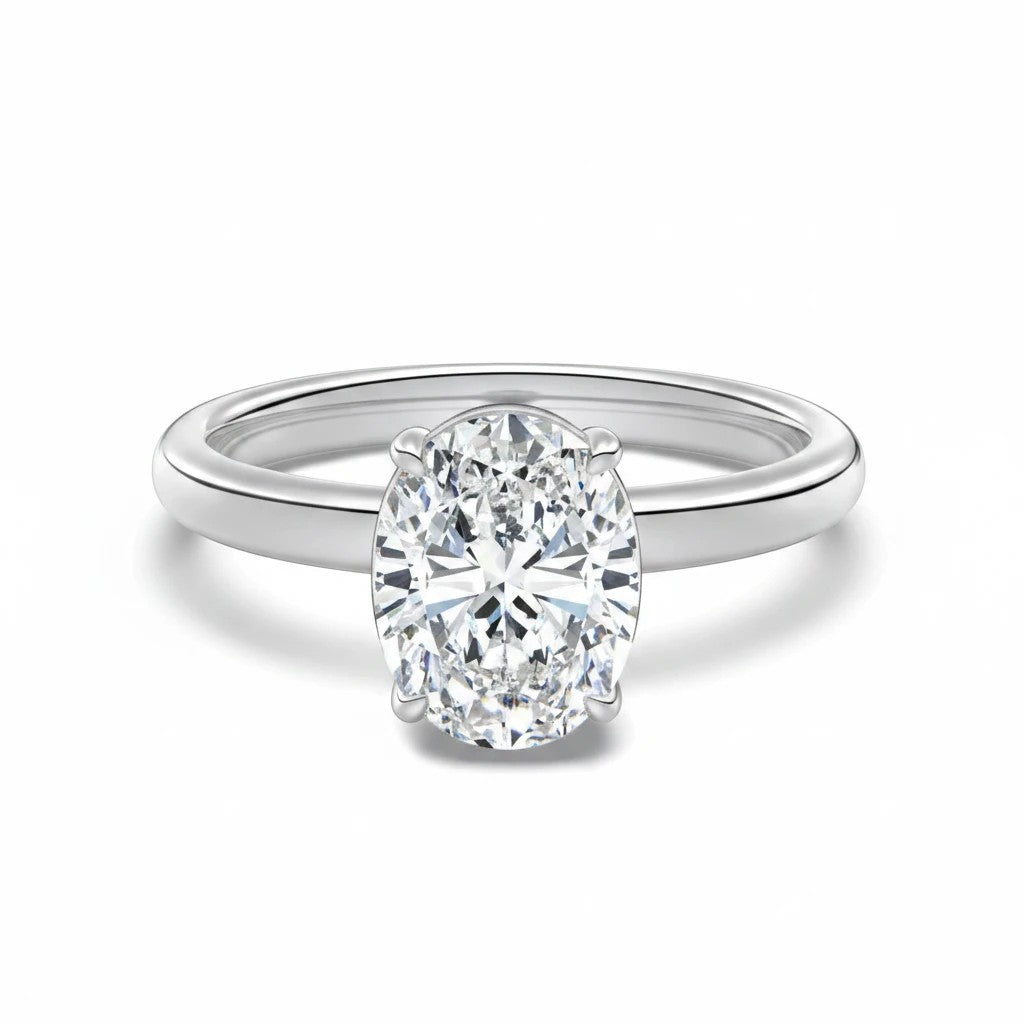 Trendzio Jewelry Sloane oval-cut moissanite engagement ring with a polished silver-tone band and four-prong setting.