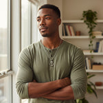 Trendzio Jewelry stainless steel anchor necklace on a man wearing a green long-sleeve shirt.