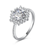 Trendzio Jewelry Veda sterling silver ring with a large hexagonal CZ diamond and halo setting on a pavé band.