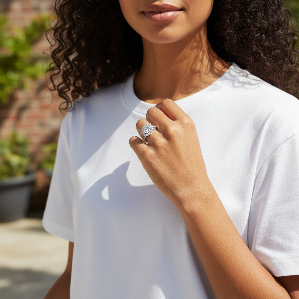 Model wearing a Trendzio Jewelry Veda sterling silver ring with a sparkling CZ diamond halo setting.