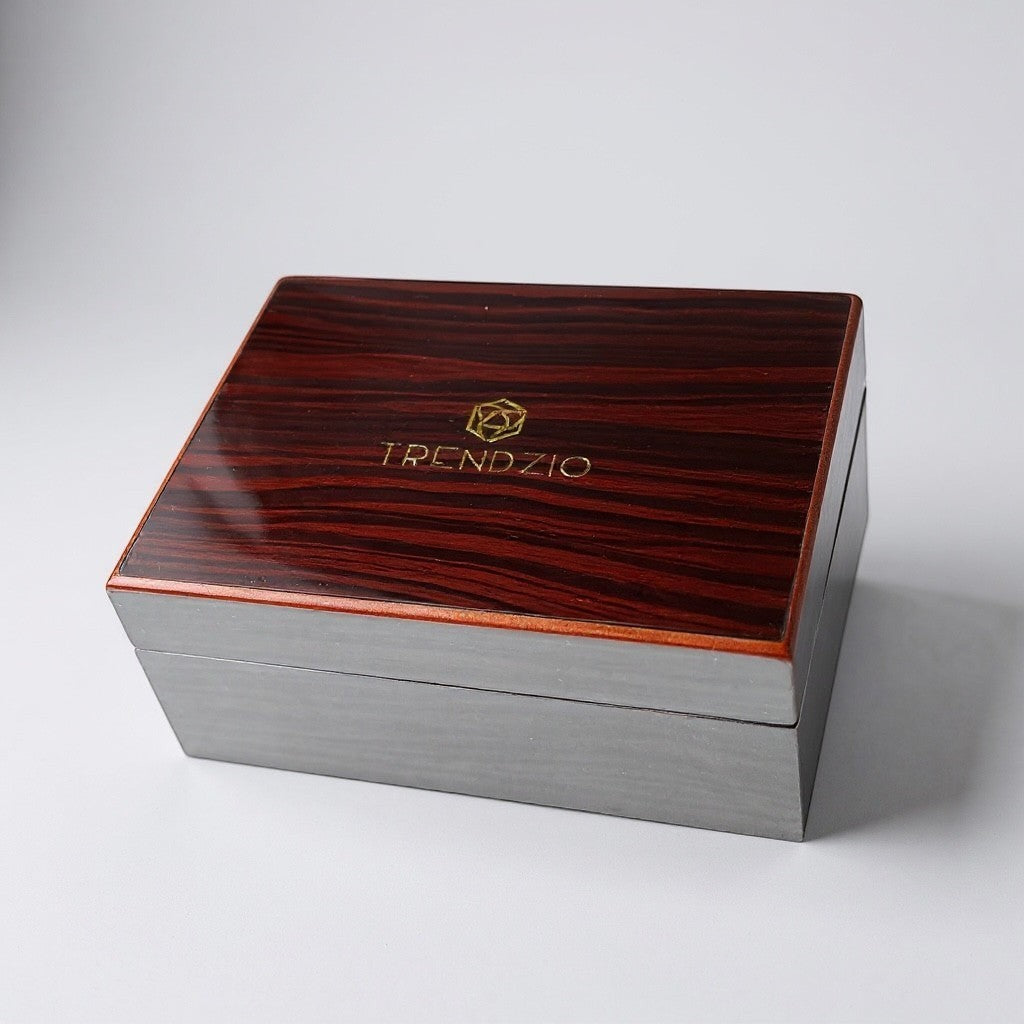 Trendzio Jewelry wooden watch box with a glossy dark wood lid featuring the Trendzio logo.