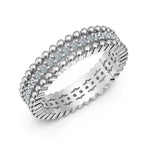 Trendzio Jewelry Zora moissanite diamond ring in sterling silver with a beaded band and intricate side detailing.