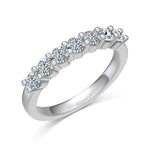 Trendzio Jewelry Zula sterling silver ring featuring a row of sparkling round-cut moissanite stones.